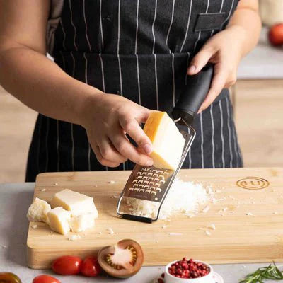 HANDHELD GRATER