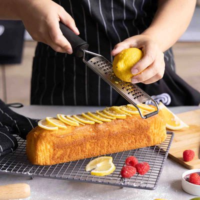 HANDHELD GRATER